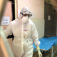 Health officials in full protective gear walk inside an isolation ward of Ernakulam Medical College in Kerala on June 6, 2019. The 2019 outbreak ultimately involved only one reported case, who successfully recovered.